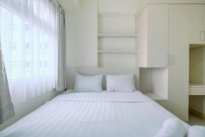 Chic and Cozy 2BR Apartment at Green Pramuka City By Travelio